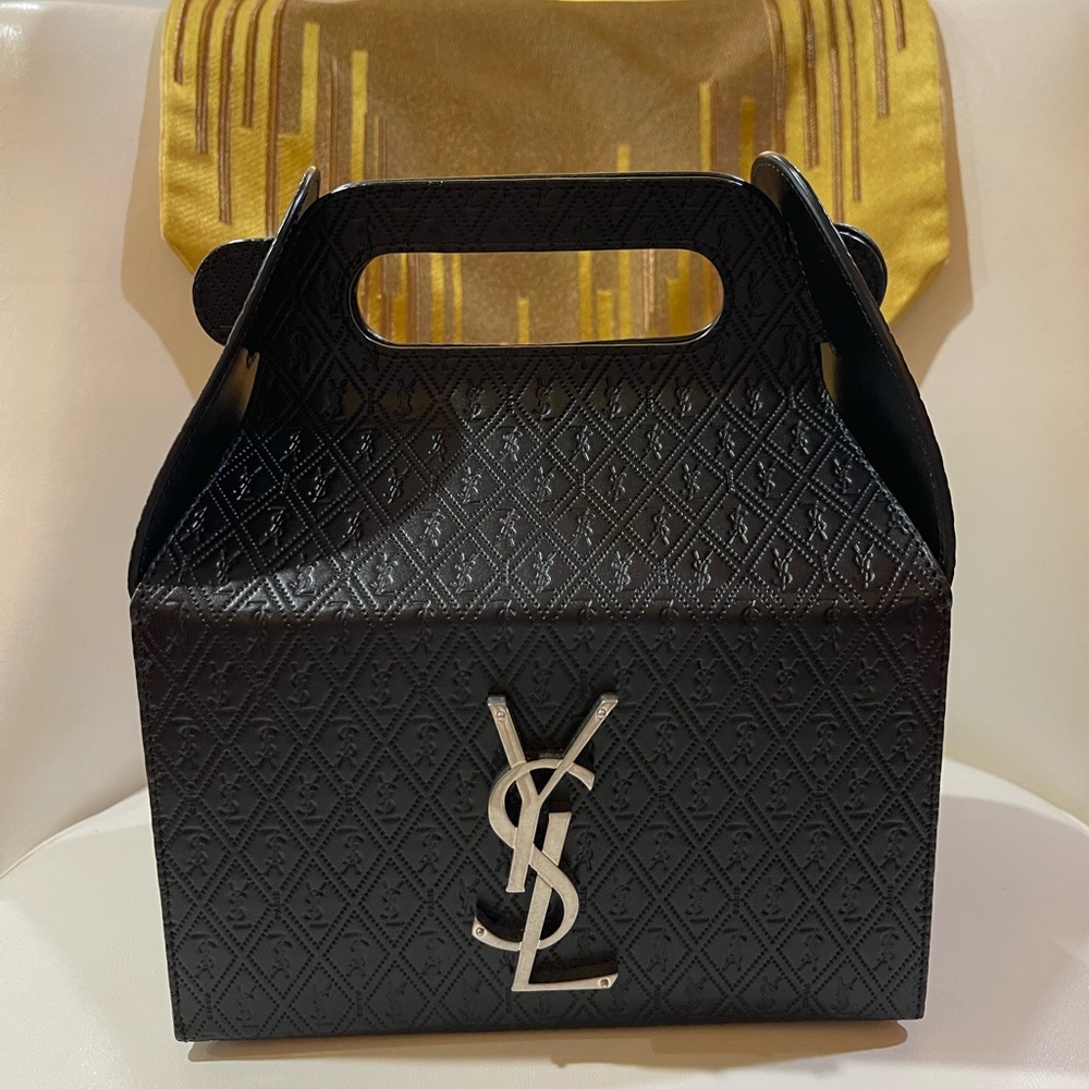 Saint Laurent “Take Away Box” and Handbag in Leather